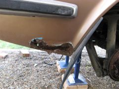 Rust rear right corner panel (May 09)