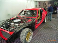 Body Painted. Sunroof all welded in. Note the front tube welded to the front guard for stability, this is all connected to the Roll Cage in the cabin.