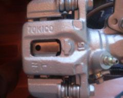 Closeup of the 280ZX rear brake caliper.